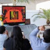 Family cheer for Jacqueline Hernandez Rico, 33, as her name comes up during the virtual Raza Grad on Saturday, June 13, 2020. (UCR/Stan Lim)